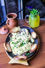 Plate of Food on Wooden Table