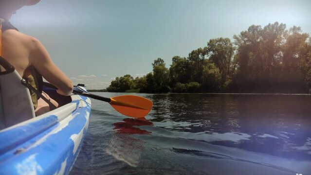 canoe rowing on river. kayaking on kayak on pond	
