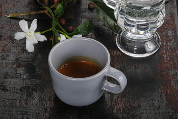 Espresso coffee with cold water