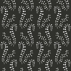 Monochrome seamless pattern with white leaves on black background