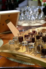 Alcohol drink in glasses on rustic table