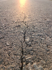 Cracks in the asphalt road