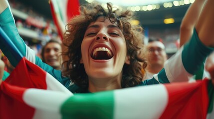 A happy fan at a public event in a stadium, holding an Italian flag with a smile and making a gesture, while enjoying the fun and leisure with a cheering crowd. AIG41