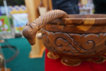 Wooden dishes in the Kazakh national style with ornaments.
