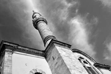 In front of the historical mosque in İzmir Kemeraltı Bazaar.The columns are striking and have...