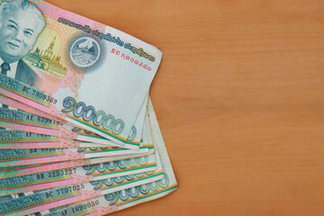 Laos kip cash on the wood table background