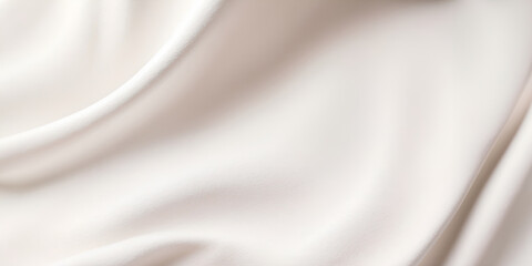 Obraz premium A white fabric with a pattern of waves. The fabric is smooth and silky. The waves are gentle and flowing, giving the fabric a sense of calmness and serenity
