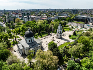 aerial view of center of city of chisinau with cathedral orthodox church and bell tower with triumph arch and Government of Moldova and Great National Assembly Square during sunny day