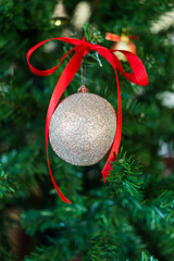 Close up Christmas decoration silver balls on a branch