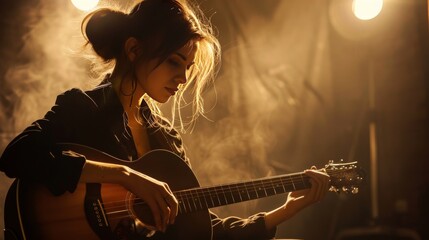 A beautiful girl playing guitar on the stage with smoke around her
