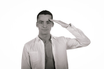Young attractive man posing in the studio.