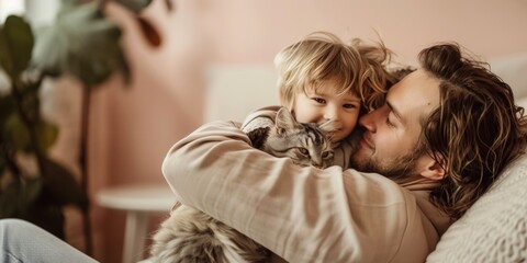 Dad hugs his son and cat. Caring fatherhood. Family photo of father and child