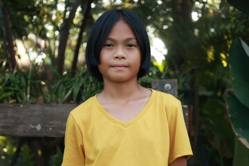 Portrait of a child in nature background 