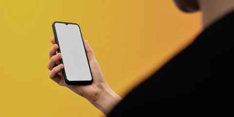 Smartphone in hand against a bright yellow backdrop, ideal for app promos