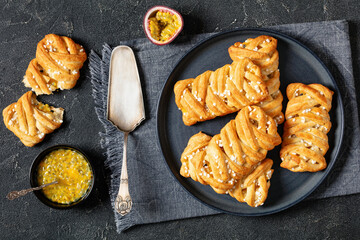 passion fruit puff pastry turnovers on a plate