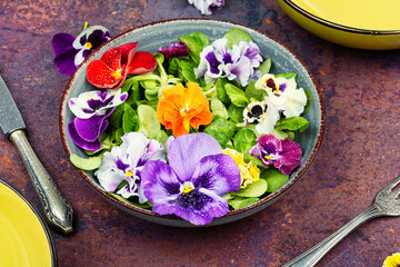 Salad of edible flowers, vegetarian food.