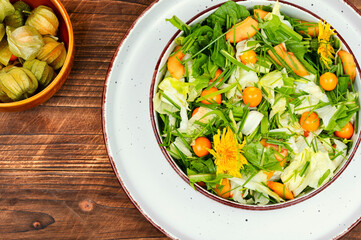 Salad with physalis and grass, detox food.
