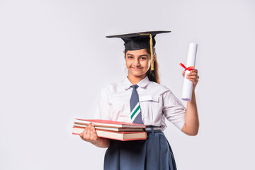 Indian asian cute little school girl wesra graduation white against white background