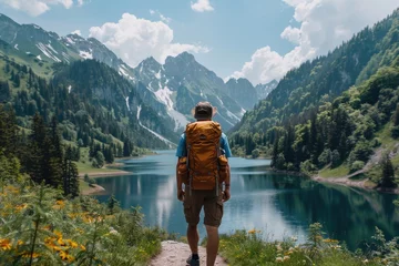 Fototapete mountaineering in front of lake with mountain landscape professional photography © NikahGeh