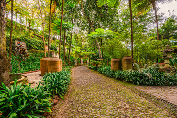 Monte Palace, Tropical Garden with Waterfalls, Lakes and traditional buildings above the city of...