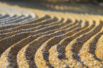 Meditative scene in a traditional Zen Garden, with sand raked into calming patterns. 