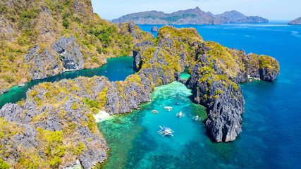 Beautiful Aerial view of One of the best island and beach destination in the world, a stunning view of rocks formation and clear water of El Nido Palawan, Philippines.