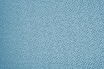 Blue wallpaper sheet as background, top view