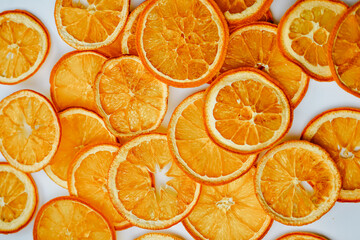 Brightly dried orange slices packed tightly together, showcasing vibrant textures and citrus aromas