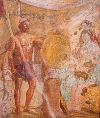 Pompeii, Italy. Ancient Frescoes In Wall Of Old Building.