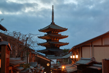 Yasaka pagoda at twilight with lights on Kyoto street Japan