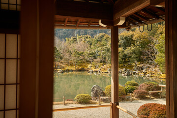 Beautiful Japanese garden with lake and wooden home and forest Japan