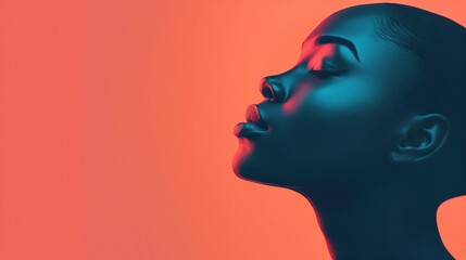 African woman's face against orange background
