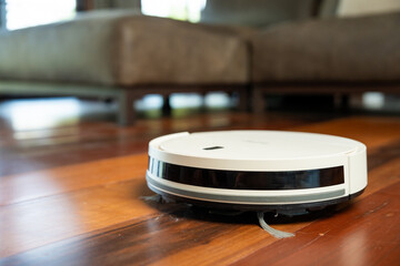 Automatic cleaning robot home. Electric vacuum cleaner to clean house Home Cleaning Service - obrazy, fototapety, plakaty