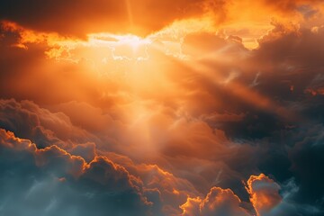Suns rays piercing through billowing clouds in the sky