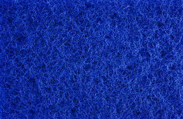 arrière plan couleur bleu foncé, texture éponge végétale