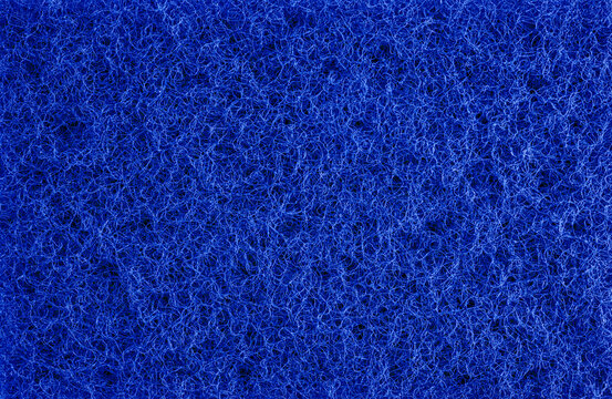 arrière plan couleur bleu foncé, texture éponge végétale
