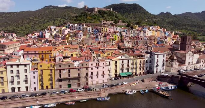 Explore the captivating streets and architecture of Bosa, Sardinia, through stunning drone footage.