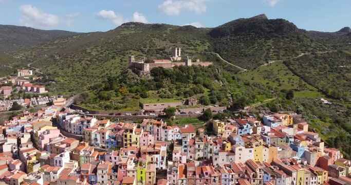 A breathtaking aerial perspective captures the enchanting castle and historic town of Bosa, Sardinia.
