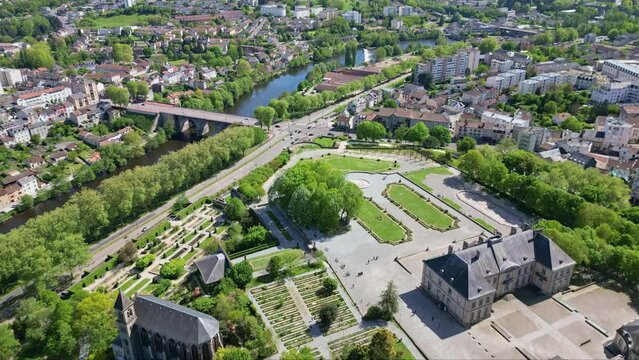 Botanical garden of bishopric and Pont Neuf bridge, Limoge in France. Aerial backward and cityscape