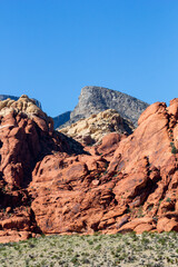 a view to the colorful red and yellow shining rock formations in the Red rock Canyon, Nevada 