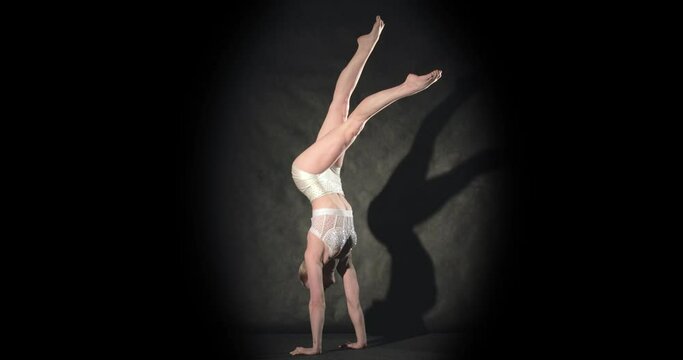 Girl acrobat in handstand pose do artistic body movements, shadow from spotlight