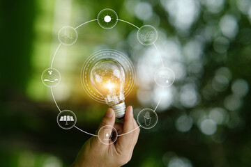 Light bulb Energy saving green nature background