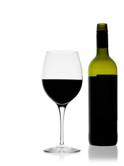 Red wine in a glass and a bottle isolated on white background