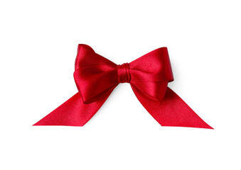 Red satin ribbon bow on white background, top view