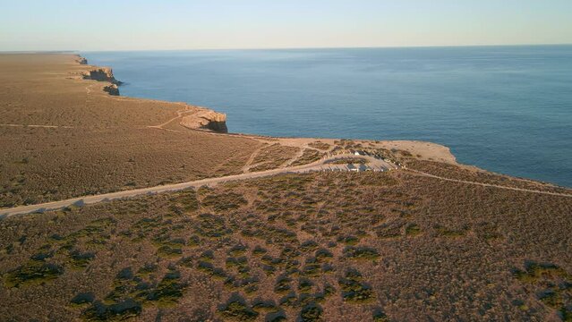 Pan aerial shot of Bunda  cliffs on a summer afternoon in Nullarbor, South Australia.