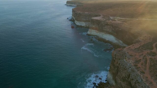 Top view of Nullarbor Cliffs beside sea in South Australia during daytime.