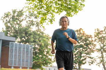 Senior old man runner exercise outdoor nature park. fitness man jogging wearing sportswear. Mature...