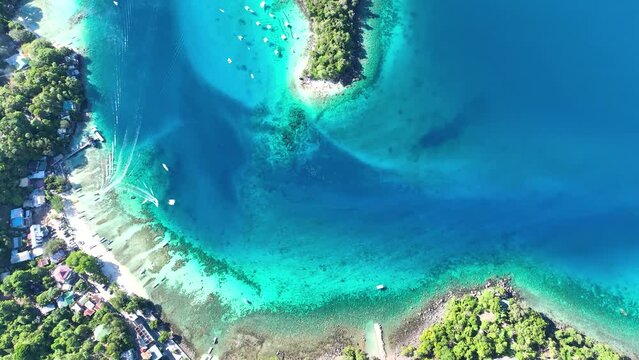 Coastal natural beauty, white sandy beaches, tranquil Asian location