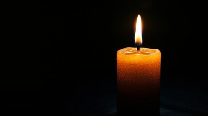 A single glowing candle in the dark, casting a warm light with a serene and calming presence