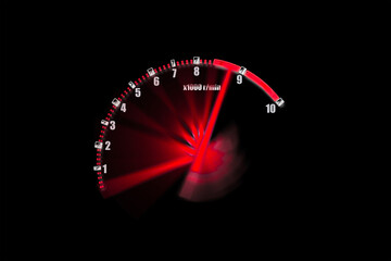 Drive at high speed with tachometer of vehicle on black background , red illuminated display , Automotive concept